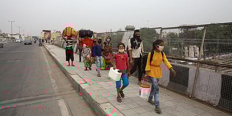 Migrant workers on their way to home during the nationwide COVID-19 lockdown in New Delhi. (Photo| Shekhar Yadav, EPS)