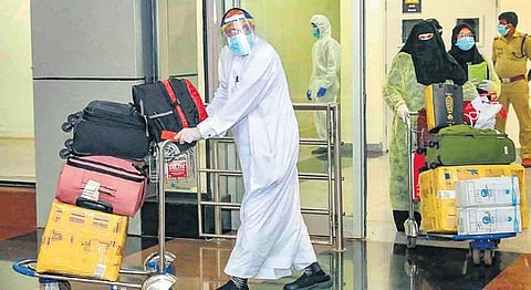Passengers arrive from Kuwait at Calicut International Airport | PTI
