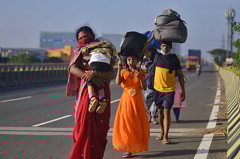 Migrant labourers from Odisha walking back home at NH16 on the outskirts of Chennai. (Photo | Debadatta Mallick, EPS)