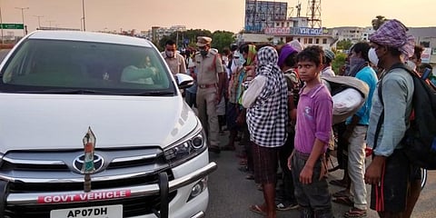 AP Chief Secretary Neelam Sahni interacting with migrant labourers at Tadepalli in Guntur district. (Photo | EPS)