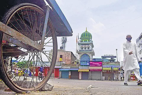 Shivajinagar Market which is usually bustling with activity, wears a deserted look after the area was sealed down, with 14 Covid-19 cases being reported here on Saturday | pandarinath b