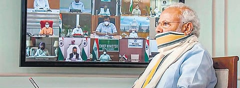 Prime Minister Narendra Modi speaks with chief ministers of various states and UTs on Monday | PTI