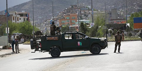 Afghan security forces inspect the site of a bomb explosion in Kabul. (Photo| AP)