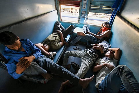 Migrants board a train from Habibganj to Arariya Bihar during the ongoing nationwide COVID-19 lockdown in Bhopal Tuesday May 19 2020. (Photo | PTI)