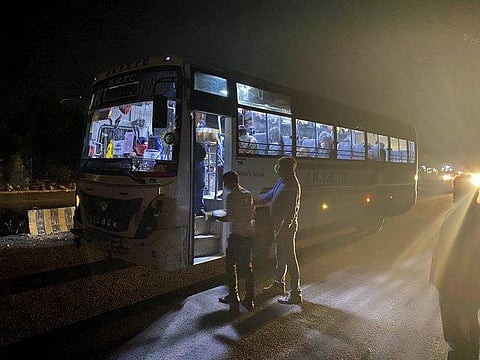 Students board a bus arranged for transport from Rajasthan's Kota to return to their home towns during the lockdown. (Photo | Twitter)
