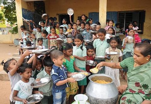Midday meal being served to students in a government school in Tirupati. (File photo | EPS)