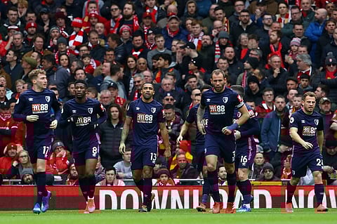 Bournemouth's English striker Callum Wilson (C) celebrates with teammates after he scores his team's first goal during the English Premier League football match. (File | AFP)