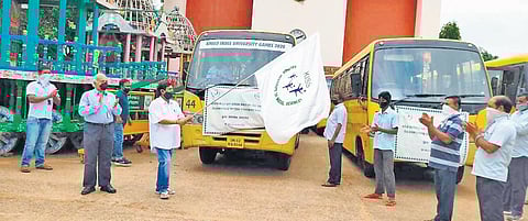 KIIT and KISS founder Achyuta Samanta flagging off the buses | Express