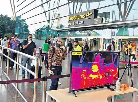 A thermal sensor at the Bengaluru airport takes the body temperature of each passenger before allowing entry | Meghana Sastry