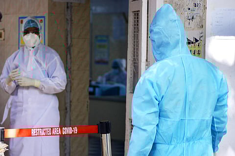 Health workers in PPE suit seen inside a Covid-19 outpatient ward. (PHOTO | DEBADATTA MALLICK, EPS)