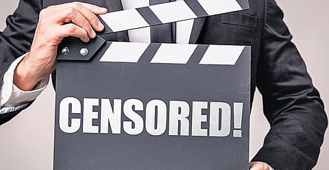 The blunt end of the censor scissors