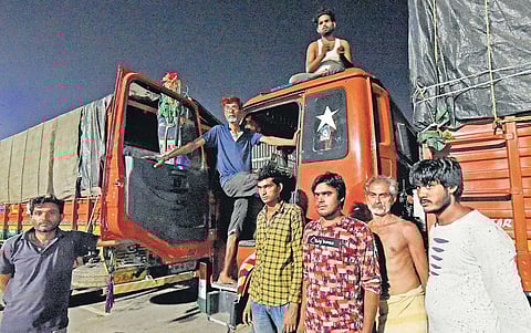 Stranded truckers from UP and MP near Nallur toll gate on NH16