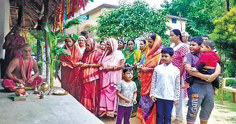Residents of Pandiri praying for Bijay Mohanty’s early recovery (Photo |EPS)
