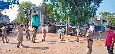 Police stand guard at Likhiria village in Balangir district I Express