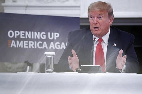 President Donald Trump speaks during a roundtable with industry executives about reopening country after the coronavirus closures, in the State Dining Room of the White House, Friday, May 29, 2020, in Washington. (Photo | AP)