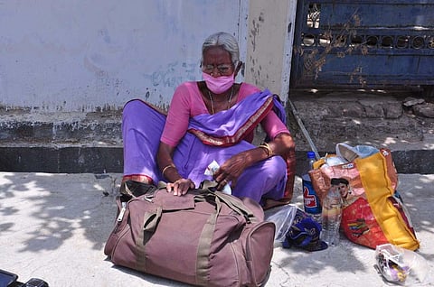 Katta Shyamala sits in front of her son’s house in Karimnagar. (Photo | EPS)