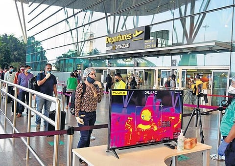A thermal sensor at the Bengaluru airport takes the body temperature of each passenger before allowing entry. (File photo| Meghana Sastry, EPS)