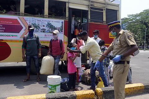 With the commencement of train services to transport migrant labourers many families are heaving the sigh of relief. Here is a child walking to towards Ernakulam Junction railway station to borad the train to Bihar. (Photo | A Sanesh/EPS)