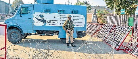 FILE | A security person stands guard outside the Civil Secretariat in Srinagar during Darbar move or shifting of government offices from Srinagar to Jammu. ( Photo | PTI )