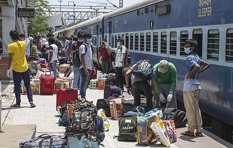 Students travelling from Kota deboard a train after arriving at Gaya junction during the ongoing COVID-19 nationwide lockdown in Gaya Monday. (Photo | EPS)
