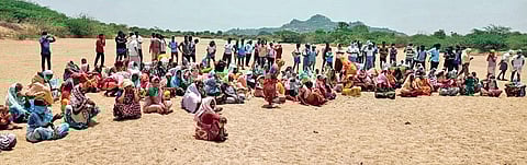Farmers and villagers protest against the State government’s decision to transport sand from the Dundubhi canal for the construction of 2BHKs, in Mahbubnagar on Tuesday. (Photo| EPS)
