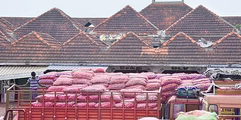 Clearing of stock at Koyambedu vegetable wholesale market on Tuesday. (Photo | R Satish Babu, EPS)