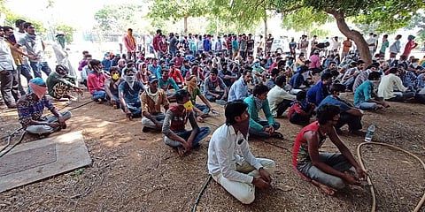 Migrant labourers in large number wait for registration at Saroornagar stadium in Hyderabad on Monday to go to their native by special trains. (Photo| RVK Rao, EPS)