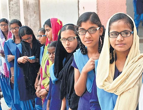 Students wearing spectacles provided by the NGO Sightsavers