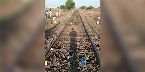 These migrants were resting at train track after walking a day from Jalna to Aurangabad. (Photo | EPS)
