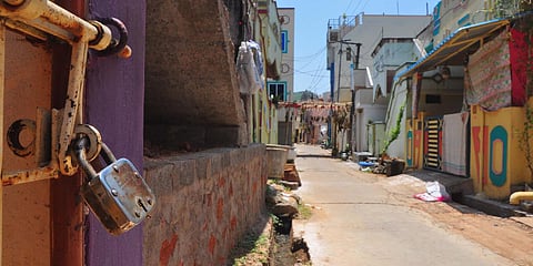 Eerie silence pervades Venkatapuram near Visakhapatnam as locked houses greet police and media persons to the village. (Photo| G Satyanarayana, EPS)