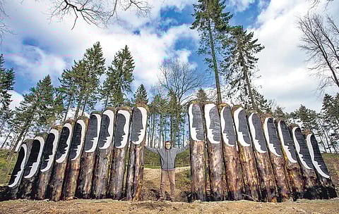 Subodh Kerkar with his work for the Himalayan Garden Sculpture Park in Yorkshire, UK
