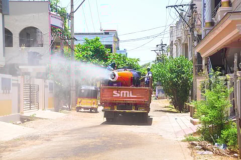 GVMC staff spraying sodium hypochlorite solution in Venkatapuram and other villages surrounding LG Polymers plant in Gopalapatnam in Visakhapatnam on Friday. (Photo | G Satyanarayana/EPS)