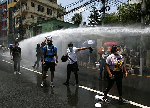 Nepalese police use water cannon to disperse youth who were protesting on the road leading to the prime minister's official residence in Kathmandu, Nepal, Tuesday, June 9, 2020. (Photo | AP)