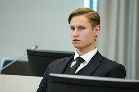 Defendant Philip Manshaus sits in a court room in Asker and Baerum district court in Sandvika, Norway, as he waits for the verdict on the last day of his trial, Thursday, June 11, 2020. The Norwegian man is charged with murder and terrorism in the killing