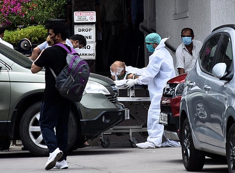 A medical worker in PPE kit at the emergency ward at sant Parmanand hospital in New Delhi. (Photo | Parveen Negi, EPS)
