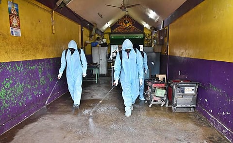 File photo of the Chennai corporation staff disinfecting the Koyambedu market in Chennai on Thursday. (Photo | P Jawahar, EPS)