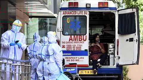 People suspected of COVID-19 step out of an ambulance at Sir Ganga Ram City Hospital on June 11 2020 in New Delhi. (Photo | Parveen Negi/EPS)