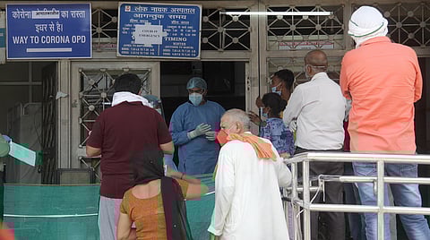 People Stand at coronavirus emergency ward at LNJP hospital in Delhi. (Photo | Anil Shakya, EPS)