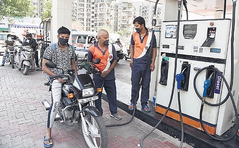 A biker gets his two-wheeler refueled at a petrol pump in New Delhi. (File Photo | Parveen Negi)