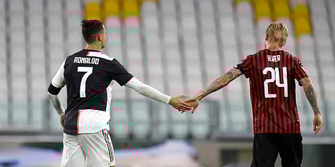 Juventus' Cristiano Ronaldo greets AC Milan's Simon Kjaer at the end of an Italian Cup second leg at Turin. (Photo | AP)