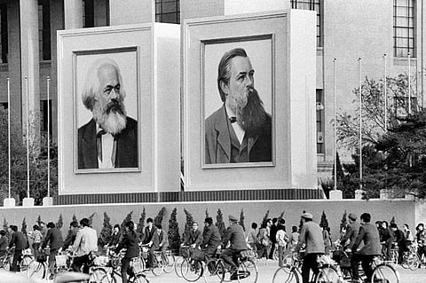 The 1848 political document 'Communist Manifesto' was co-authored by German revolutionaries Karl Marx and Friedrich Engels. (Photo | AFP)