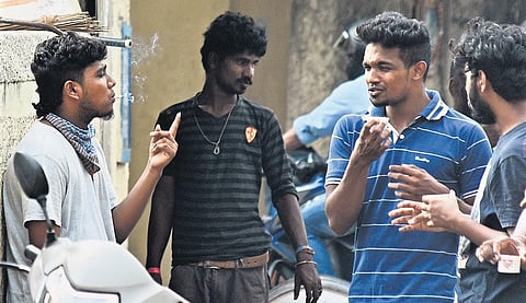 No mask, no social distancing, but only a puff. A scene on Chennai road. (Photo | Ashwin Prasath, EPS)