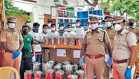 Police and volunteers prepare provisions to help affected families in Chennai
