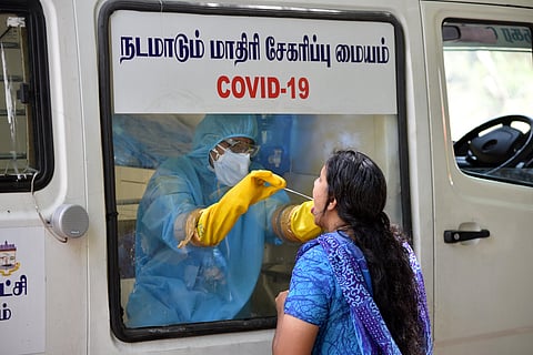 Medical team of a mobile hospital taking a swab test at police quarters at Kilpauk in Chennai on Tuesday. (Photo | R Sathish Babu/EPS)
