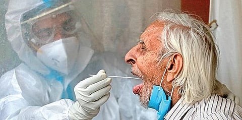 Medical staff carries out COVID-19 testing. (Photo | EPS)