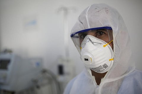 In this March 15, 2020 file photo, a medic sets up an isolation room in a coronavirus quarantine ward at a hospital in Sanaa, Yemen. (Photo | AP)