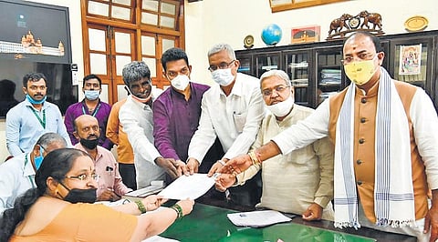 BJP leaders Aravind Limbavali, DyCM Govind Karjol and Nalin Kumar Kateel accompany MLC candidate Pratap Simha Nayak
