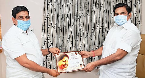 Animal Husbandry Minister Udumalai K Radhakrishnan inviting  CM Edappadi K Palaniswami for his daughter’s wedding