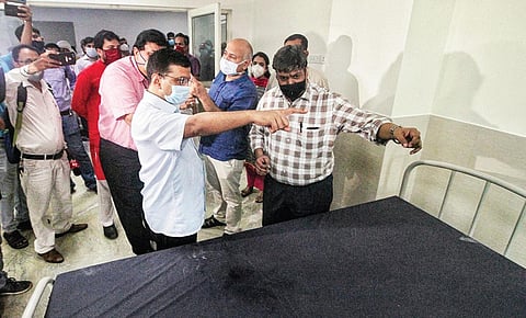 Delhi CM Arvind Kejriwal and his deputy Manish Sisodia inspect a hospital which is all set to be opened at Burari. (Photo | PTI)