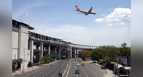 Over the empty roads though, flights continued to ferry travellers in and out of the city on Friday | Martin Louis
